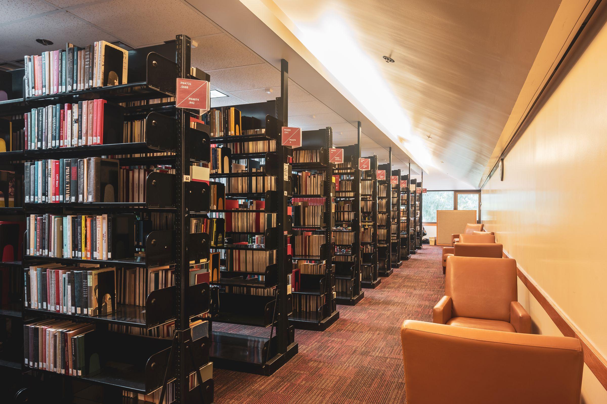 A quiet library with armchairs — the kind of considered residential space that distinguishes luxury rehab from clinical wards