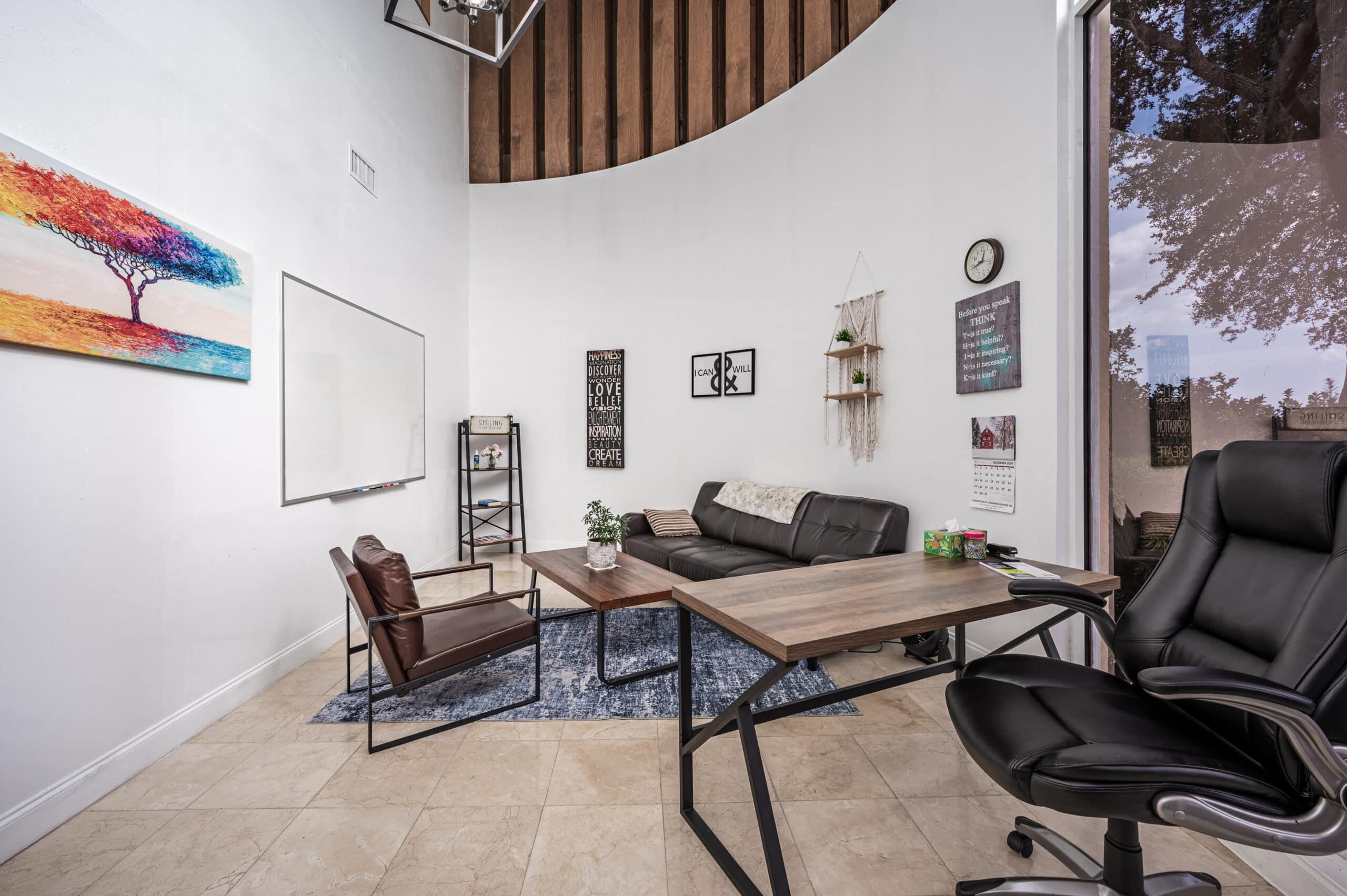 A lounge inside Tikvah Lake Recovery's lakefront mansion