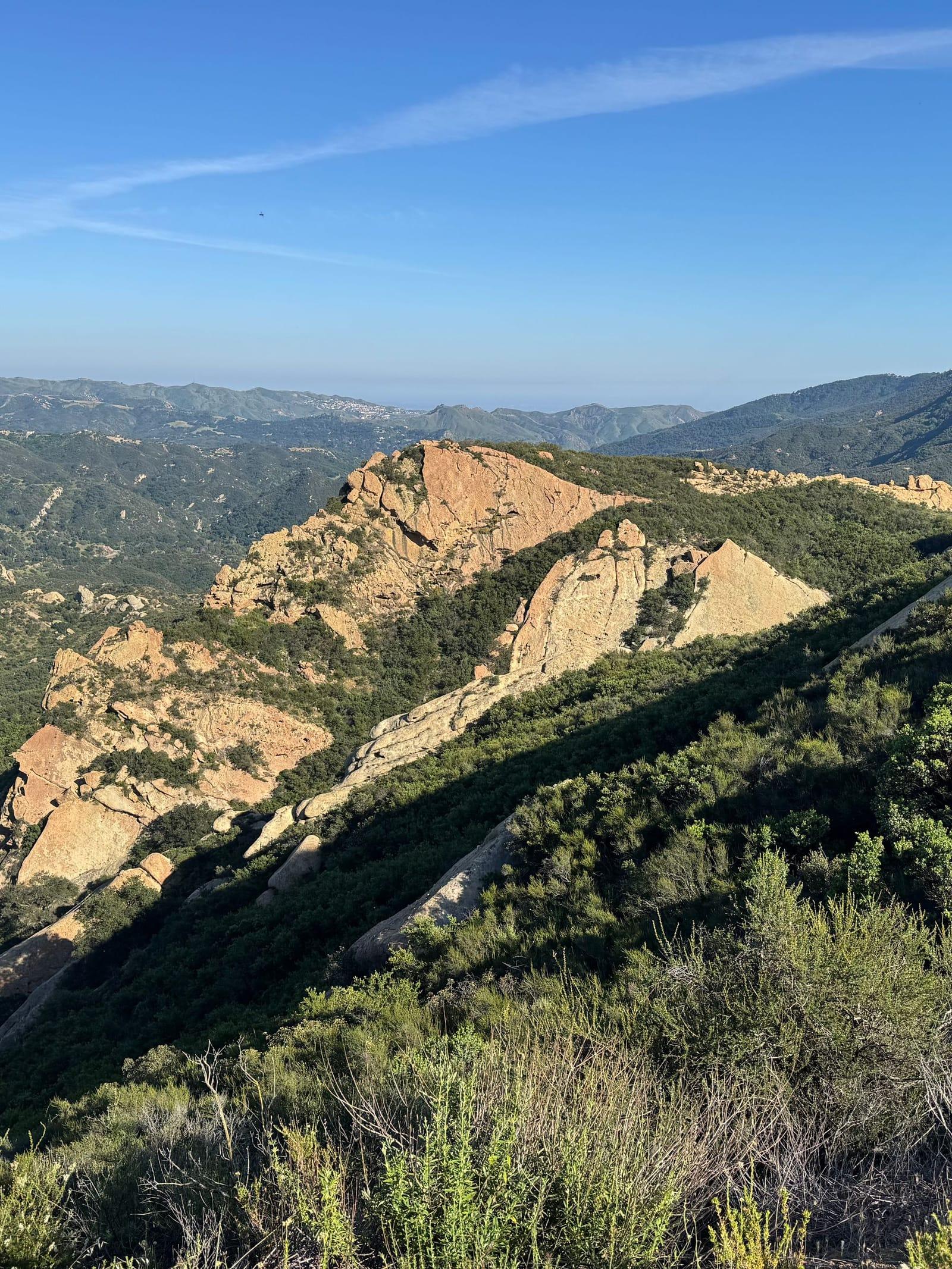 Canyons and ridgelines in the hills above Malibu under a clear sky